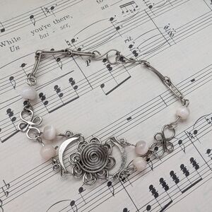 Silver-Tone Floral Crescent Bracelet with Pale Pink Beads